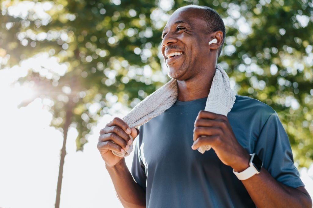 middle-aged man exercising in the morning, morning sunlight