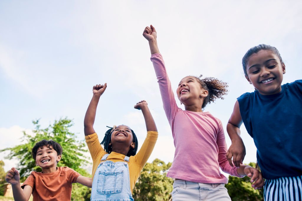 happy kids playing in a park