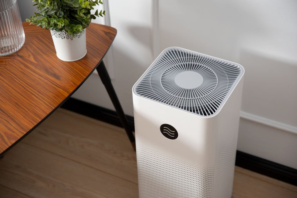 air purifier improving air quality in a home office