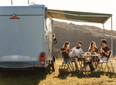camper trailer, family enjoying outdoor picnic