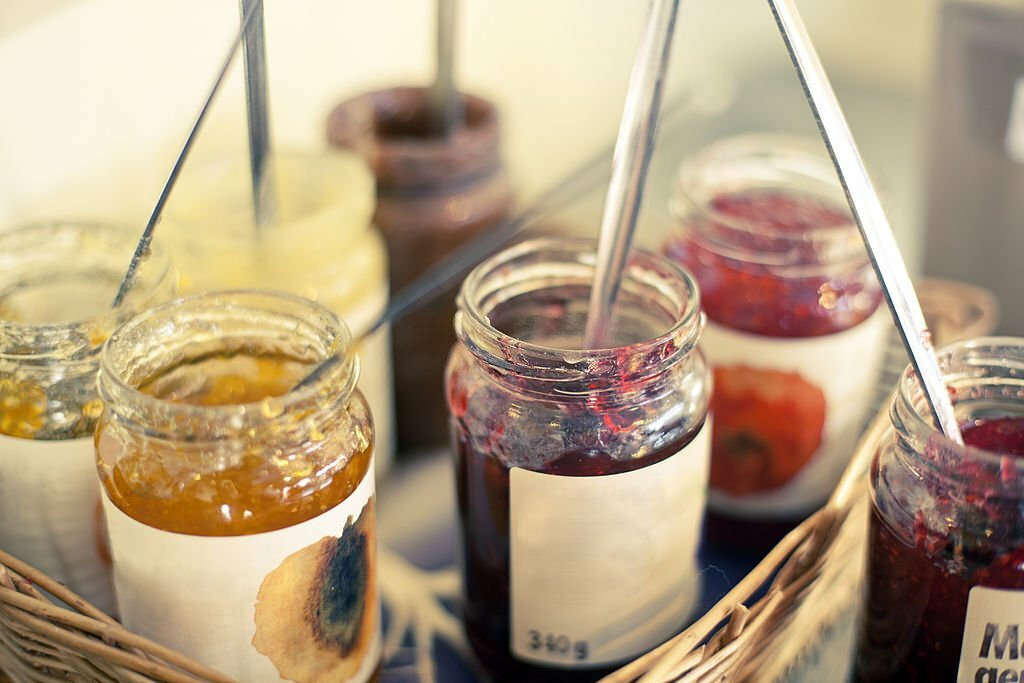 fruit jam, jam jars in a basket