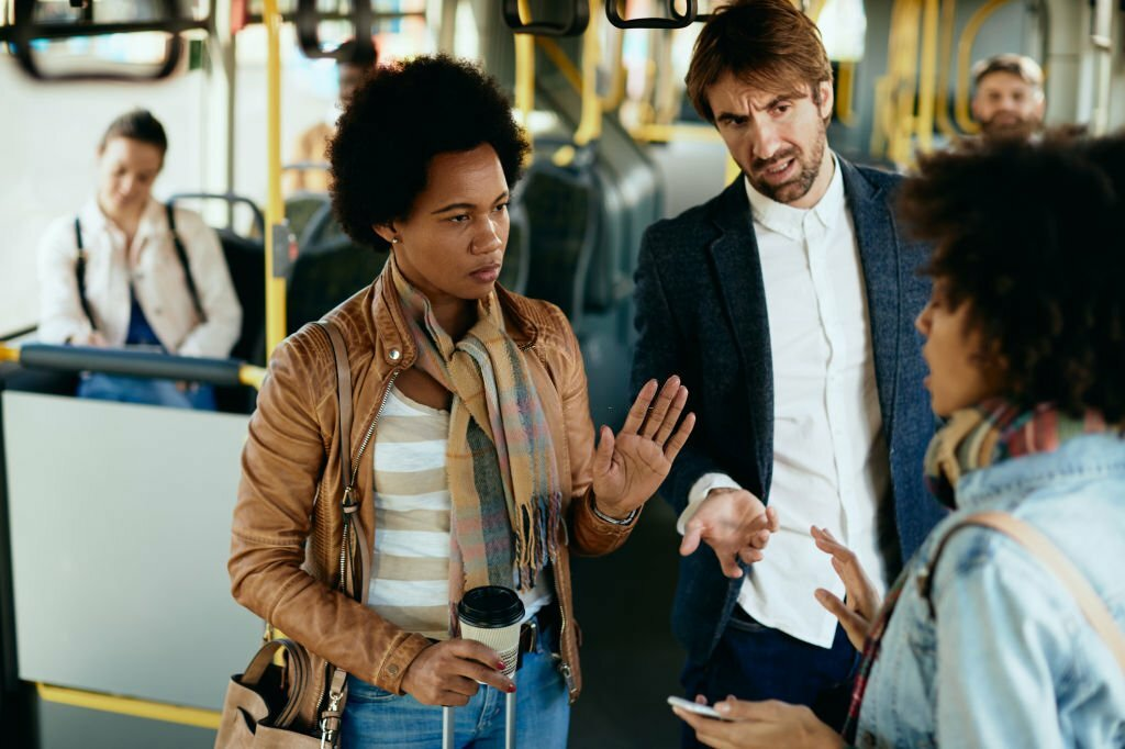 people arguing on a bus, communication barrier