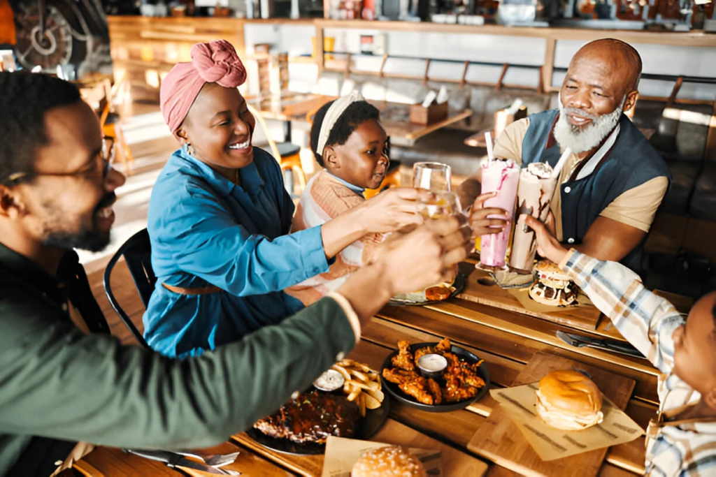 food expense on vacation, happy family having lunch at a restaurant