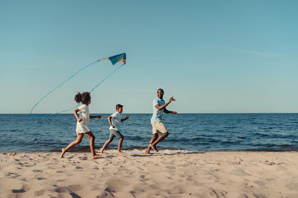 family playing on a beach, beach resorts